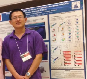 photo: Dr. Yizhen Li by his poster